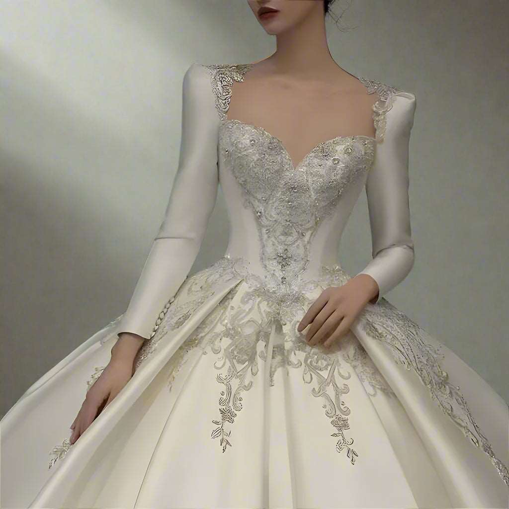 Delicate White Silk Wedding Gown with Sweetheart Neckline & Silver Embroidery