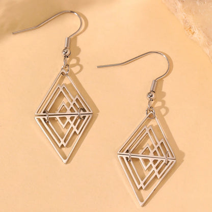 Women's Geometric Hollow Cutout Triangle Pyramid Stainless Steel Dangle Earrings